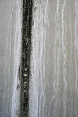 A wall with a white line and a black line
