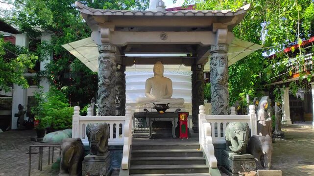 buddha statue in the Gangarama temple, Colombo, Sri Lanka