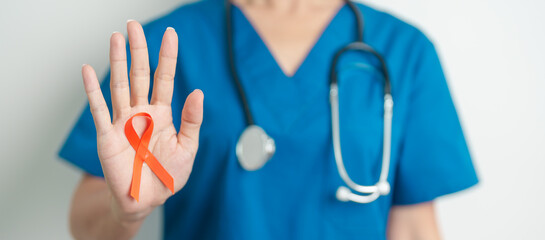 Doctor with Orange Ribbon for Leukemia, Kidney cancer day, world Multiple Sclerosis, CRPS, Self...