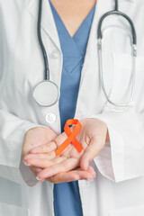 Doctor with Orange Ribbon for Leukemia, Kidney cancer day, world Multiple Sclerosis, CRPS, Self...