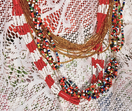 Bahian women's necks, brightly colored beaded necklaces representing the spirits of Candomble, the Afro-Brazilian religion. Salvador, Bahia, Brazil, 2021
