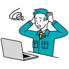 トラブルになるノートパソコンで仕事をしている作業員の男性