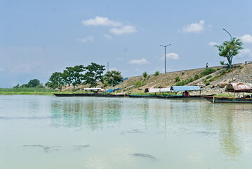 landscape view of a river barrage on a bright sunny day in India