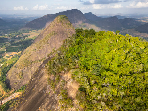 Aerial drone view of a rocky mountain range in the rural area of Aguia Branca, Espirito Santo, Brazil