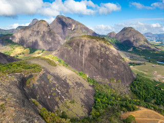 Aerial drone view of a rocky mountain range in the rural area of Aguia Branca, Espirito Santo, Brazil