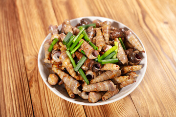 A plate of stir-fried snails