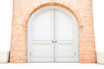 Obraz premium White door with brick arch
