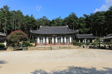 Bae-dong Gyeongju-si, Gyeongsangbuk-do, South Korea - August 4, 2022: Front and summer view of yard and Daeungjeon Hall of Mangwolsa Temple at Gyeongju Namsan Mountain  © JinChang