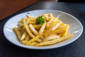 fried french fries on a white plate