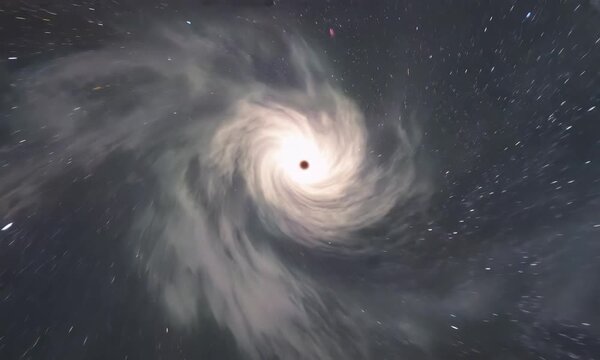 A spiral galaxy with a bright quasar in the center. 4K video