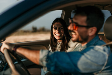 Shot of a young couple going a road trip together