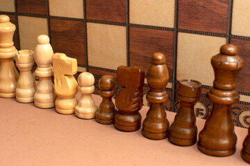 Chess pieces on chess board background	