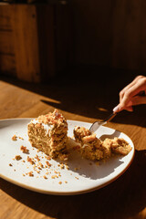 delicious Napoleon cake on a wooden table in a beautiful bar
