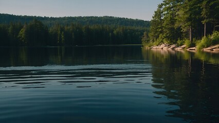 Naklejka premium A picturesque lake view with reflections of a serene winter dawn