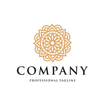 luxury ornamental mandala design background in gold color. luxury flower logo design with business card. Elegant logo design for spa, yoga, etc