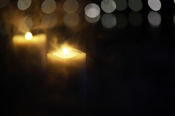 Soft Glowing Candlelight with Bokeh Effect in Dark Background