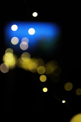 Abstract Bokeh Lights against Dark Background Creating Dreamy Effect