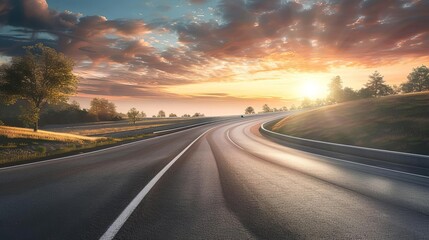 Naklejka premium Scenic sunset view of an empty winding road surrounded by green trees and landscape under a dramatic sky, perfect for travel and journey themes.