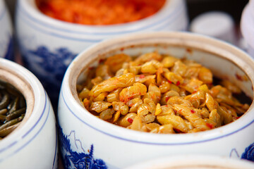 Delicious pickled vegetables in jars