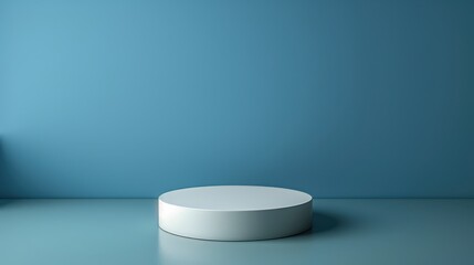 A white pedestal is sitting in a room with a blue wall