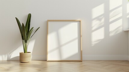 Modern minimalist interior featuring empty frame and potted plant in sunny daylight.