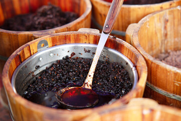 Black bean chili sauce in a wooden barrel