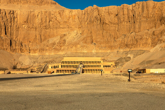 Discover the ancient majesty of Hatshepsut's tomb as the sun rises over the Nile Valley. The terraced temple of Djeser-Djeseru offers a breathtaking sight at dawn.