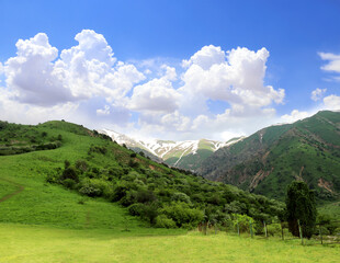 Beautiful landscape in Chimgan mountains, Tashkent region. Aerial view of idyllic mountain scenery in Western Tien Shan Mountains near Charvak Lake, Uzbekistan