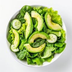 Green Salad with Avocado, Cucumber and Nuts on White Plate