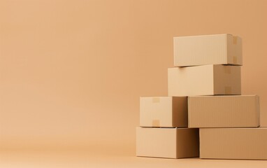 A stack of beige cardboard boxes placed on a neutral background, symbolizing packaging, shipping, or storage solutions. Ideal for logistics, e-commerce, or minimalist design themes.