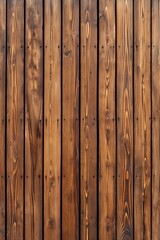 Naklejka premium A close-up of aged and weathered wooden planks with warm brown tones, creating a rustic and natural texture. Perfect for backgrounds, design projects, or decor inspiration.
