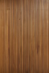 A close-up of vertical wooden texture stripes in varying brown tones, creating a natural and minimalist abstract pattern. Perfect for backgrounds, design, or wood-themed projects.