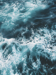 Fototapeta premium The sea water is a dark blue and white, with ripples on the top of it