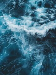 Fototapeta premium The sea water is a dark blue and white, with ripples on the top of it