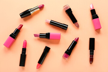 Obraz premium Set of different lipsticks on color background