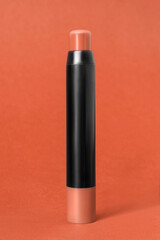 Obraz premium Concealer on brown background
