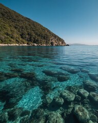 Fototapeta premium bay with crystal clear water backgroundvertical background vertical shot