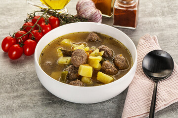 Soup with meatball and potato