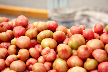 A pile of ripe tomatoes