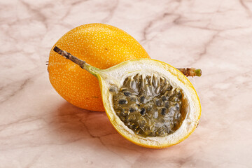 Yellow granadilla with cut half