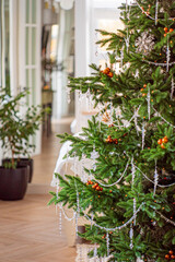 stylish Christmas tree in the room