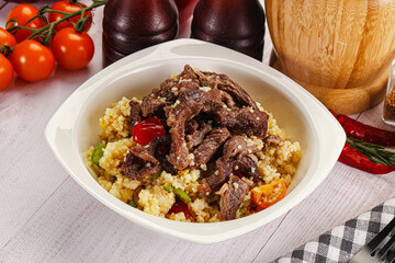 Traditional couscous with beef and vegetables