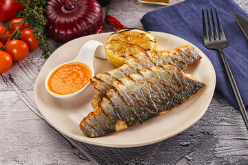 Grilled seabass fillet with lemon