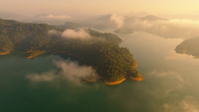 4K aerial drone footage of small islands in Kao Sok National Park during a sunrise, Thailand, Asia