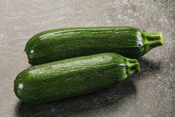 Raw green ripe zucchini vegetable