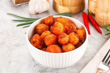 Baked young potato with paprika
