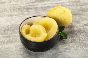 Canned yellow pear with syrup