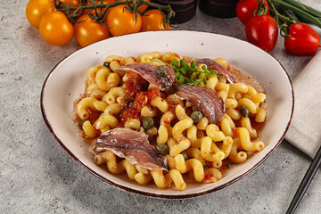 Italian pasta cellentani with anchovy