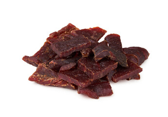 closeup pile of beef jerky isolated on white background