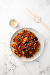 Noodles with roasted eggplant and sesame seeds